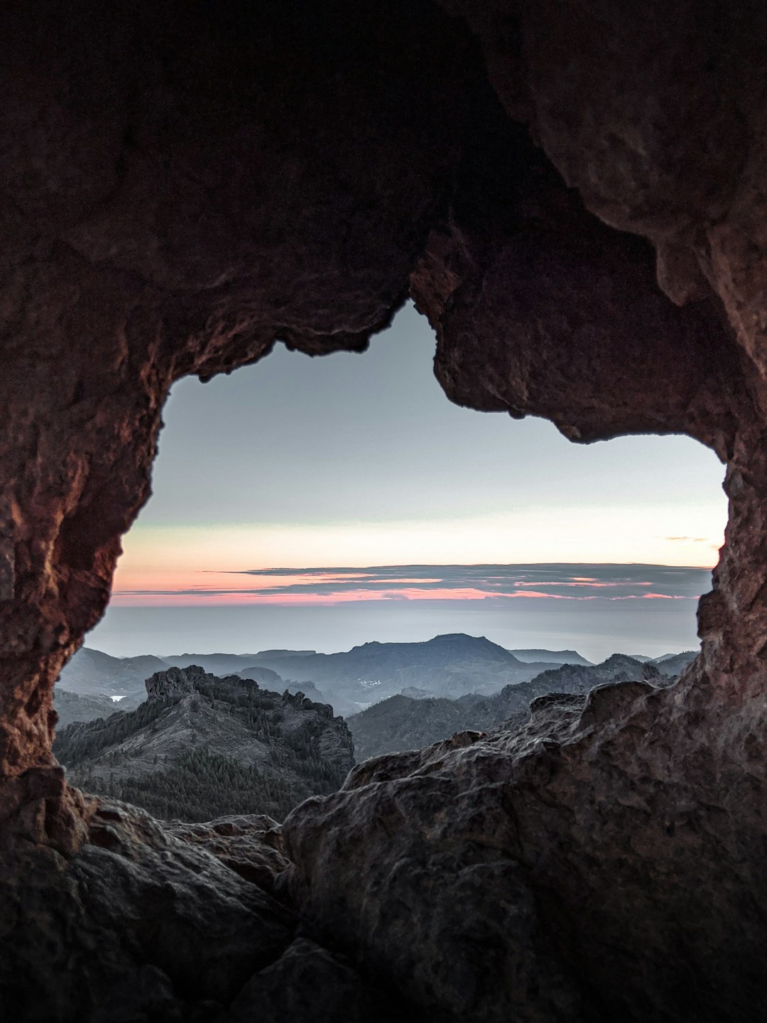 Home The highest point in Gran Canarias, Spain. You can see the sea and in this image, the sun is setting just right
